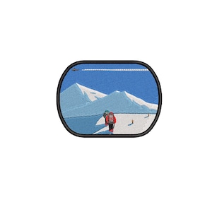 May include: Embroidered patch featuring a mountain scene with a hiker in a red backpack. The patch has a black border and depicts snow-covered mountains under a blue sky. A plane flies overhead.