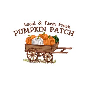 May include: An embroidered design featuring a wooden cart filled with pumpkins in various colors: orange, white, and green. The text above reads "Local & Farm Fresh PUMPKIN PATCH". The cart has wooden wheels and is set on a patch of green grass.