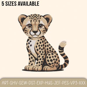 May include: An embroidered cheetah cub design with a tan and black spotted pattern. The image includes the text "5 SIZES AVAILABLE" at the top and "ART-SHV-SEW-DST-EXP-HUS-JEF-PES-VP3-XXX" at the bottom. The cheetah is sitting.
