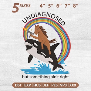 May include: An embroidery design featuring a brown horse riding a black and white orca whale. The horse holds a firing gun. A rainbow arches behind them above blue water splashes. Text reads: 5 SIZES 4" 5" 6" 7" 8" UNDIAGNOSED but something ain't right.