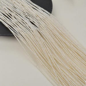 Mini perlas de agua dulce naturales de 1,8 mm, accesorios de joyería, perlas a granel, una tira de aproximadamente 37-38 cm