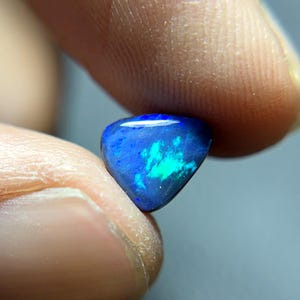 Australian Doublet Opal, 1.60 Carat, Size 8x7x4 MM Triangle Shape