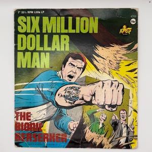 Vintage 1976 Power Records Six Million Dollar Man 7” Vinyl + Comic Book #2310 “The Bionic Berserker”
