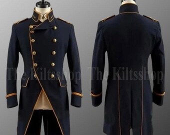 May include: A navy blue military-style coat with gold buttons and trim, displayed on a mannequin. The coat features a double-breasted front, high collar, and epaulettes. The text "The Kiltsshop" is visible at the bottom of the image.