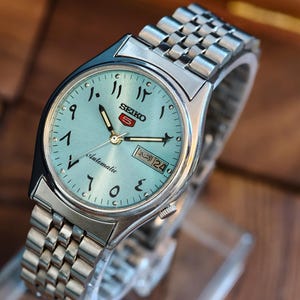 カスタムMOD NH35自動巻き搭載 ブラックベゼル グリーンブルー発光