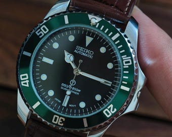 Reloj de pulsera automático Seiko vintage para hombre, bisel verde, esfera negra, ref. 6309, correa de cuero genuino.