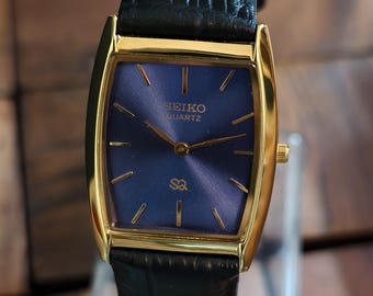 Reloj Seiko Slim de cuarzo vintage con esfera azul chapada en oro, reloj de pulsera clásico para hombre.