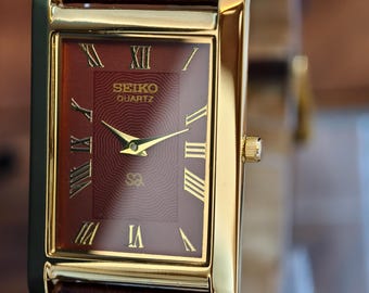 Vintage Seiko Quartz Tank Watch: Maroon Dial, Gold Case, New Leather Strap