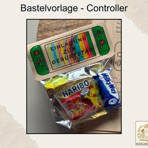 May include: A craft kit with a controller-shaped card, green accents, and the text "INVITATION TO BIRTHDAY". The kit includes a clear bag with Haribo gummy sweets and a Milky Way chocolate bar.