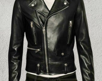 May include: Black leather motorcycle jacket with a classic asymmetrical zip closure, multiple zippered pockets, and silver hardware. The jacket features a notched lapel collar and a tailored fit, suitable for various styles.