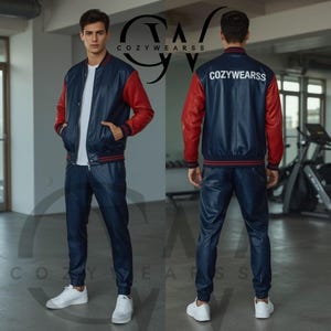 May include: A two-piece leather outfit in navy blue and red. The jacket has red sleeves and a navy blue body with a red and navy blue striped trim. The matching pants are navy blue. The text "COZYWEARSS" is on the back of the jacket.