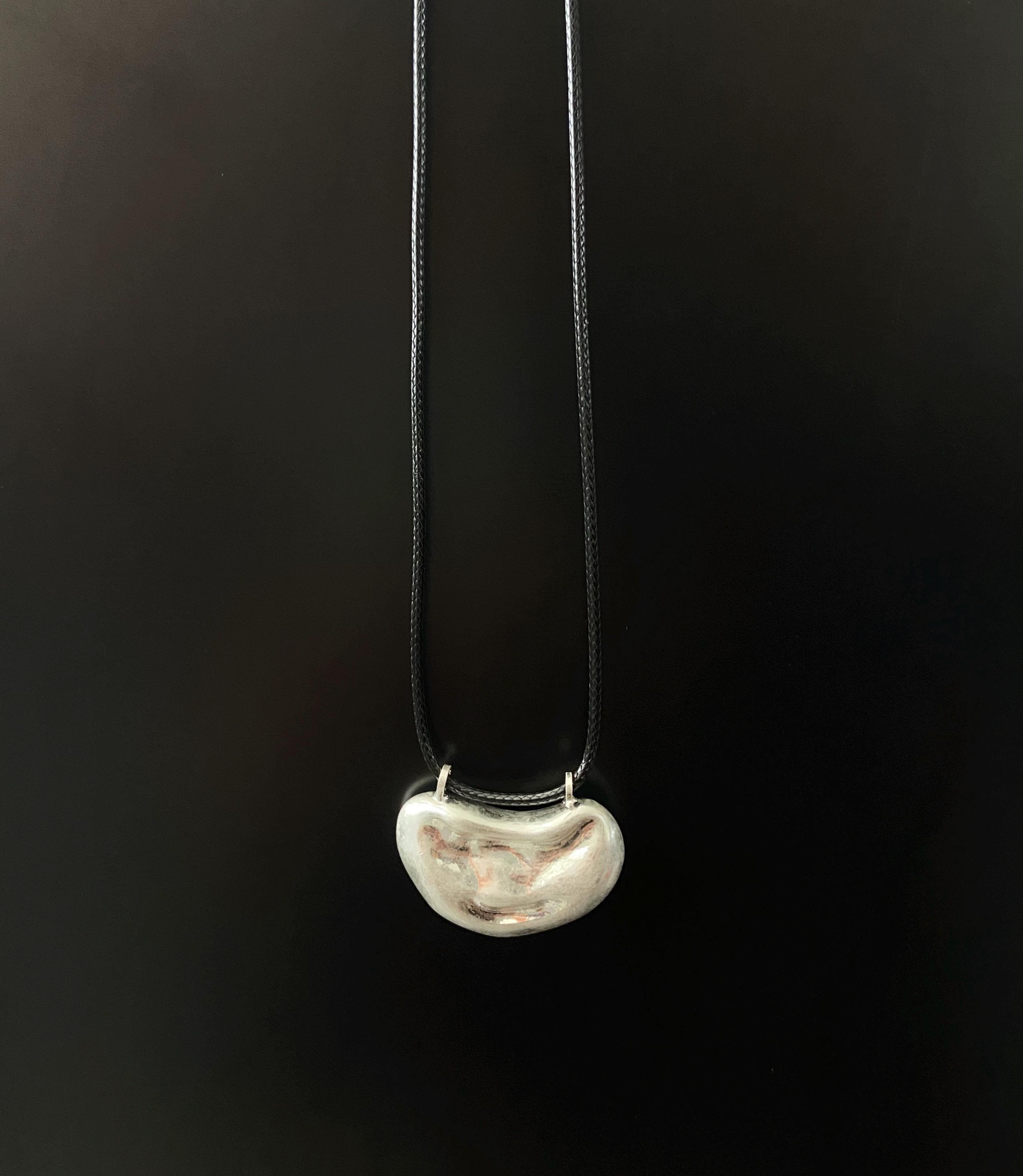 Handcrafted Organic Bean-Shaped Silver Pendant on Black Cord Necklace – Minimalist, Modern Jewelry