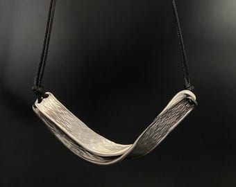 Modern Silver Twisted Pendant Necklace: Abstract Black Cord Jewelry