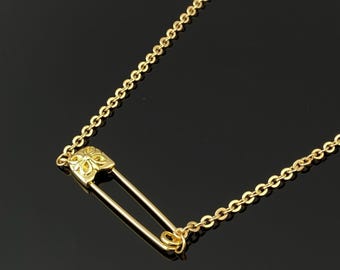 Gouden veiligheidsspeldketting: sierlijke punk-chique gelaagde sieraden