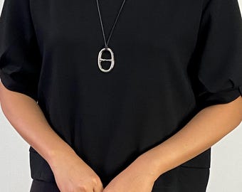 Modern Silver Oval Pendant Necklace – Sculptural Minimalist Statement on Black Cord