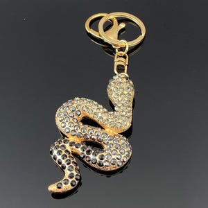 Sleutelhanger met strass-slang: gouden tashanger slang - Fierce Gothic Jewelry