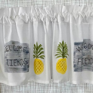 May include: White valance with a pineapple and "Welcome Friends" design. The pineapple is yellow with green leaves and the sign is painted on a gray wood background.