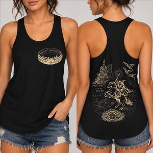 May include: A black racerback tank top featuring a gold graphic of the One Ring on the front. The back displays a detailed gold illustration of a wizard on horseback, a castle, flying creatures, and the text Minas Tirith and Rohan.