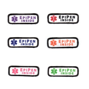 May include: Six rectangular patches with the text "EPIPEN INSIDE" and a medical symbol. Each patch has a different color scheme: purple, red, blue, orange, pink, and green, with a black border. The patches are on a white background.
