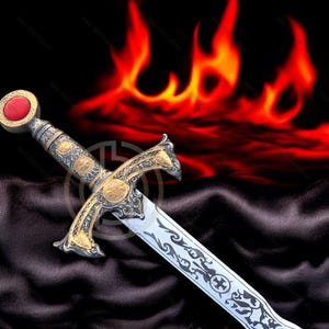 May include: An ornate sword with a silver blade and gold accents. The hilt features a red stone and intricate designs. The background includes a fiery red and orange graphic, creating a dramatic effect. The sword is displayed against a dark, textured backdrop.