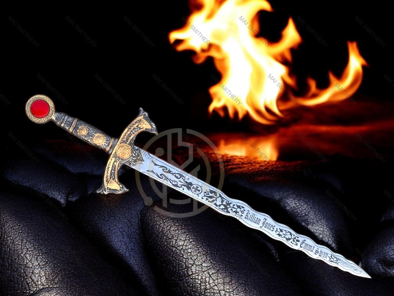 May include: An ornate dagger with a gold hilt and a silver blade, featuring engraved details and the names "Killian Jones" and "Emma Swan". The handle has a red gem. A fiery background adds drama.