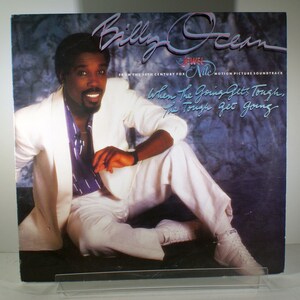 May include: A vinyl record album cover featuring Billy Ocean, the album title "When the Going Gets Tough, The Tough Get Going", and the movie title "The Jewel of the Nile".