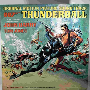 May include: A vintage vinyl record cover for the James Bond film "Thunderball". The cover features a scene of James Bond fighting an underwater villain. The title "007 Thunderball" is printed in large, bold letters at the top of the cover. The album is by John Barry, with the title song sung by Tom Jones.