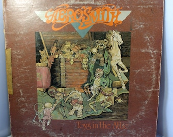 Aerosmith - Toys In The Attic vinyl record Album Columbia 33479