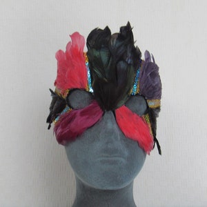 Multi-color feathers and sequins create a Fairy Princess, Queen or Elf Feather Mask on soft suede for dancing, parades and celebrations