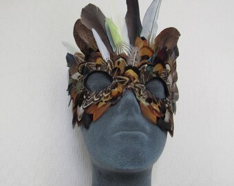 A Feather Mask to Celebrate Diversity or Create a Fantasy Creature for a Costume Party or Parade on Suede