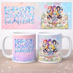 May include: Two white ceramic mugs with the text "K-POP DEMON HUNTERS" in blue. One mug features the same text, the other has a colorful illustration of anime characters, bunnies, and Easter eggs. The background is a pastel gradient.