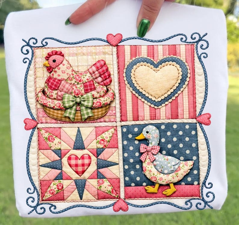 May include: White square fabric with a patchwork design featuring a chicken in a basket, a heart, a star, and a duck. The design incorporates floral patterns, stripes, and polka dots in pink, red, blue, and green. The border is a dark blue with decorative swirls and hearts.