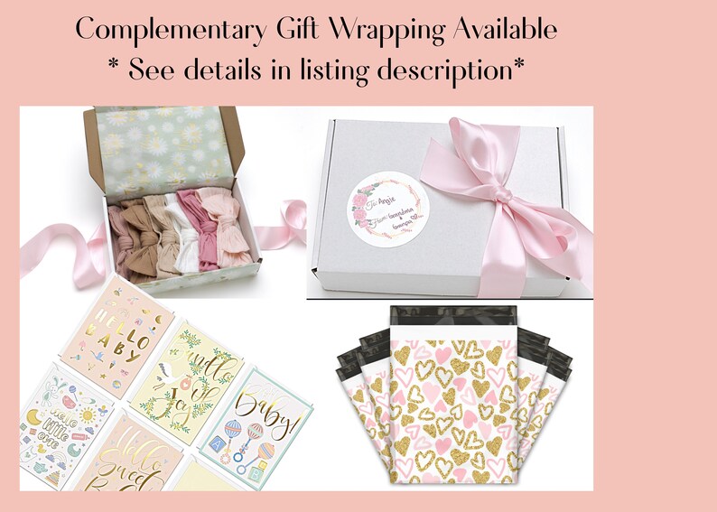 May include: An assortment of baby-themed items, including headbands, greeting cards, and packaging. The headbands are in a variety of neutral colors and are displayed in an open box. The cards have gold foil accents and the text "Hello Baby".