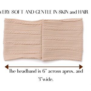 May include: A light beige headband with a textured design. The headband is 6 inches across and 3 inches wide. "VERY SOFT AND GENTLE IN SKIN and HAIR" is written above the headband.