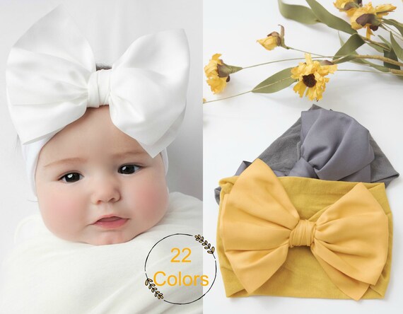 white newborn bow