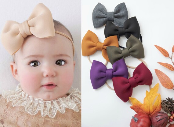 baby girl with big bow