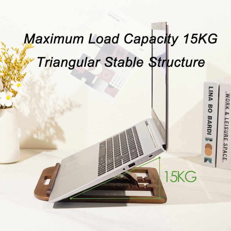 May include: A wooden laptop stand supporting a silver laptop. The stand has a triangular stable structure and can hold up to 15KG. Text on the image reads "Maximum Load Capacity 15KG" and "Triangular Stable Structure".