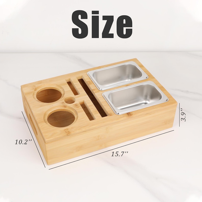 May include: A bamboo serving tray with two stainless steel containers, two circular cutouts, and several slots. The tray is 15.7 inches long, 10.2 inches wide, and 3.9 inches high. The word "Size" is printed in black at the top.