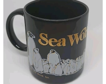 Vintage 1991 Sea World Black Ceramic Mug With Gold Logo Penguin Whale  Graphics - Etsy
