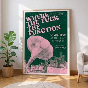 May include: A framed poster with a green background and pink text and graphics. The text reads "WHERE THE FUCK THE FUNCTION" and includes event details. A pink gramophone graphic is featured. The poster is displayed in a room with a plant and a white rug.