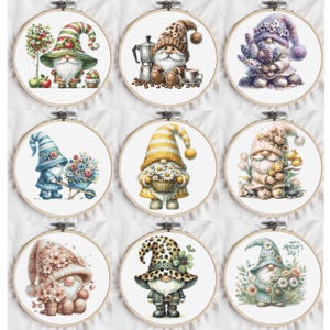 May include: Nine framed cross-stitch artworks featuring whimsical gnomes. Each gnome is depicted in a unique setting, with various hats, outfits, and accessories. The color palette includes greens, blues, yellows, and pinks, with some gnomes holding flowers or other items.