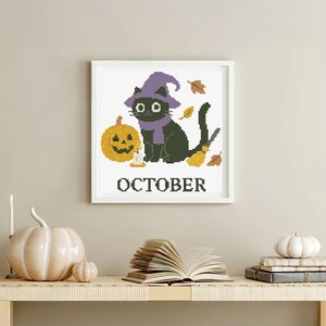 Cross stitch pattern set of 12 seasonal black cats, each in a unique monthly theme with flowers, costumes, or accessories. PDF digital download for embroidery lovers.