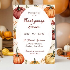 May include: Thanksgiving Dinner invitation card with watercolor pumpkins and fall leaves. The invitation includes the date, time, and location. The background features balloons, candles, and autumn decor.