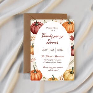 May include: Thanksgiving dinner invitation with watercolor pumpkins in shades of orange, red, and yellow. The invitation includes the text "Thanksgiving Dinner" and event details. The invitation is paired with a brown envelope.