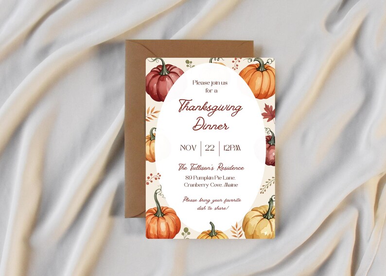 May include: Thanksgiving dinner invitation with watercolor pumpkins in shades of orange, red, and yellow. The invitation includes the text "Thanksgiving Dinner" and event details. The invitation is paired with a brown envelope.