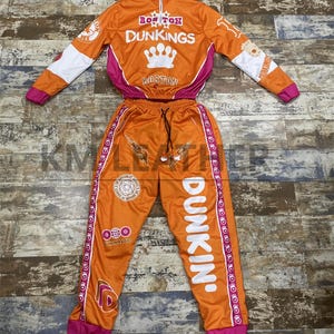 orange nike jogging suit womens