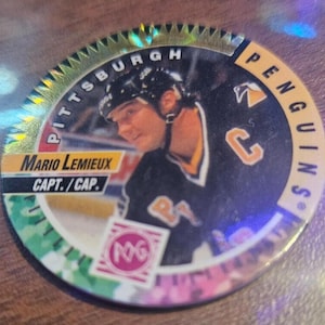 Tarjeta de hockey de los Penguins de la NHL POGS de los Juegos de Canadá 1994-95 n.° 185 de Mario Lemieux