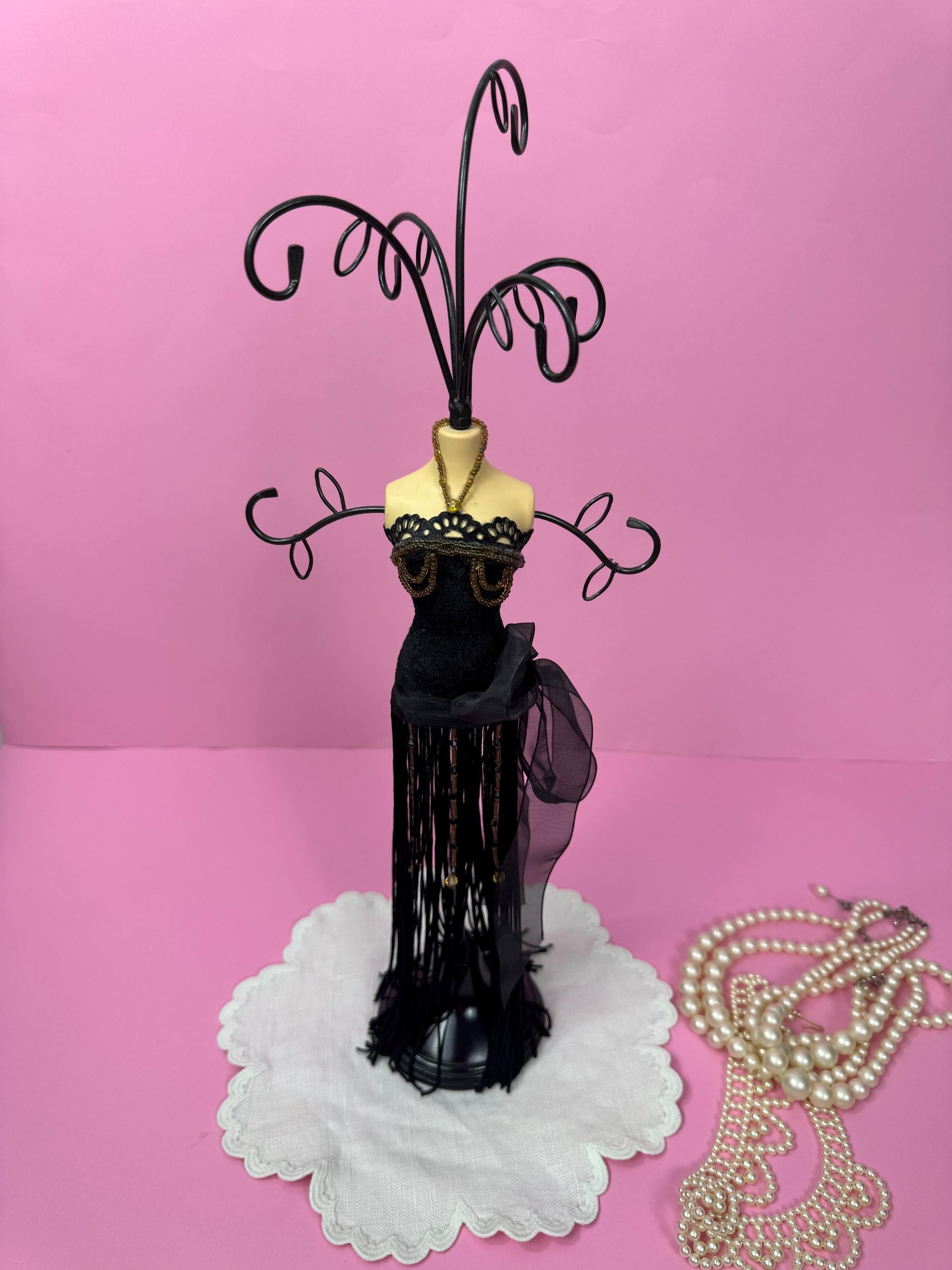 black dress with pink jewelry Henris Black Dress with Silver Bow