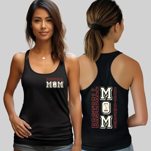 May include: Black baseball mom tank top with the words "Baseball Mom" in white and red lettering. The front of the tank top has the words "Baseball Mom" with a baseball graphic. The back of the tank top has the words "Baseball Mom" and "Custom Name".