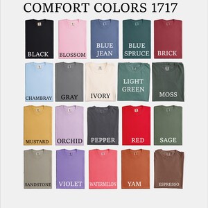 a bunch of different colors of shirts on a white background